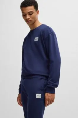 Cotton-blend tracksuit bottoms with metallic logo label