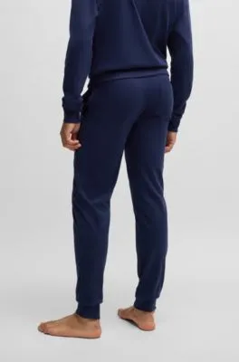 Cotton-blend tracksuit bottoms with metallic logo label