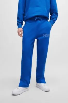 Loose-fit cotton-terry tracksuit bottoms with outline logo