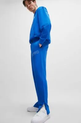 Loose-fit cotton-terry tracksuit bottoms with outline logo