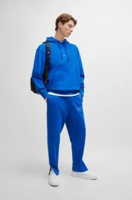 Loose-fit cotton-terry tracksuit bottoms with outline logo