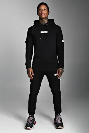 MAN Official Hooded Cargo Tracksuit With Badge | boohooMAN UK